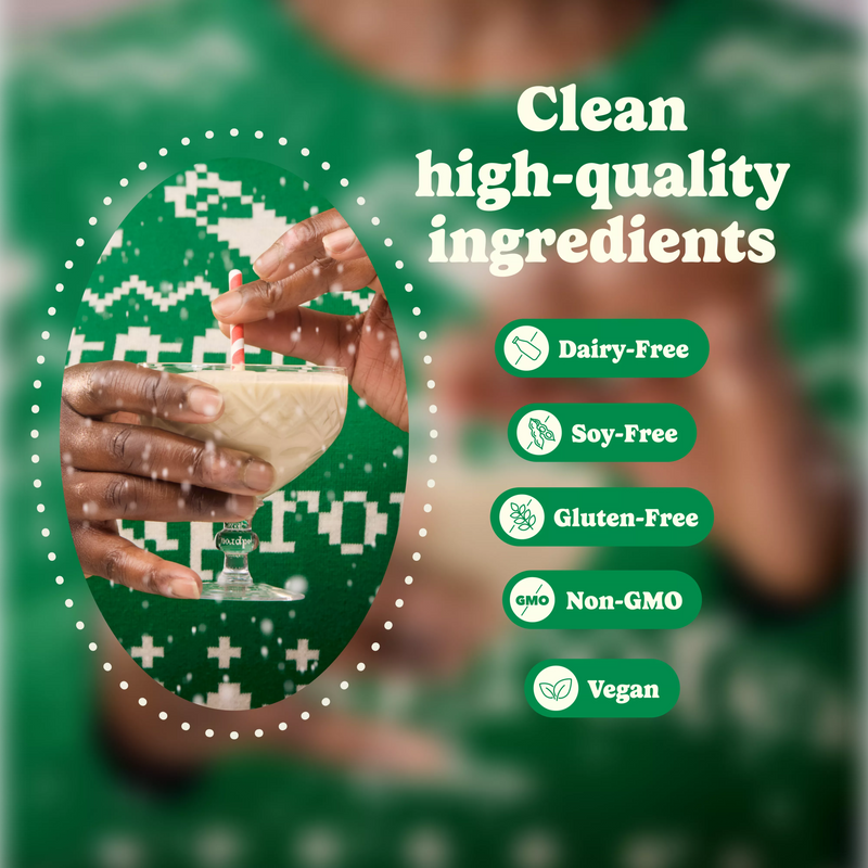 Person holding a festive glass of Good Protein Eggnog All-in-One Shake dairy-free, soy-free, gluten-free and vegan benefits.